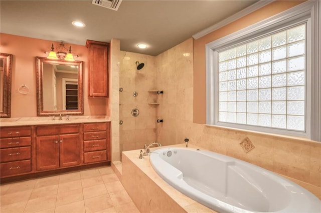 6219 Perlita Dr, New Orleans, LA 70122 - full bathroom with a bath, vanity, tile patterned floors, a tile shower, and recessed lighting