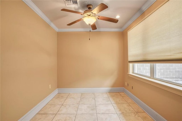 6219 Perlita Dr, New Orleans, LA 70122 - spare room with crown molding, ceiling fan, light tile patterned flooring, and baseboards