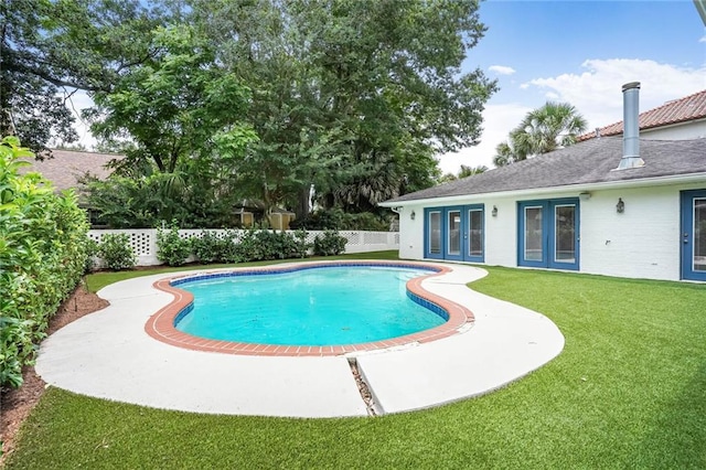 6219 Perlita Dr, New Orleans, LA 70122 - view of swimming pool with french doors and a patio
