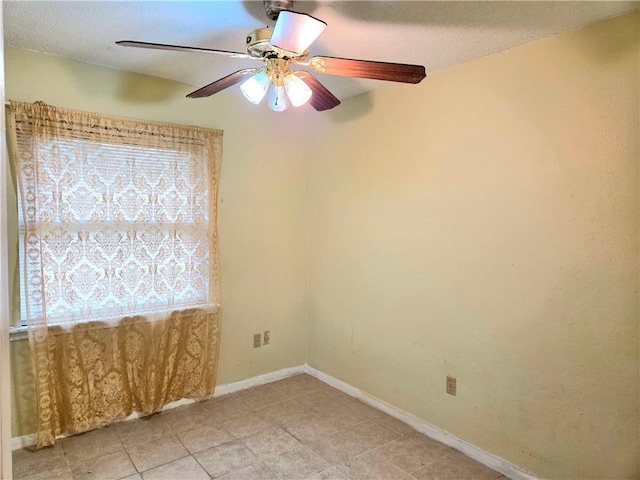 126 Boardwalk St, La Place, LA 70068 - empty room with ceiling fan, baseboards, and light tile patterned floors
