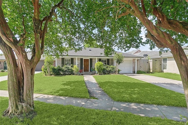 4804 Antonini Dr, Metairie, LA 70006 - ranch-style house featuring driveway, a garage, and brick siding