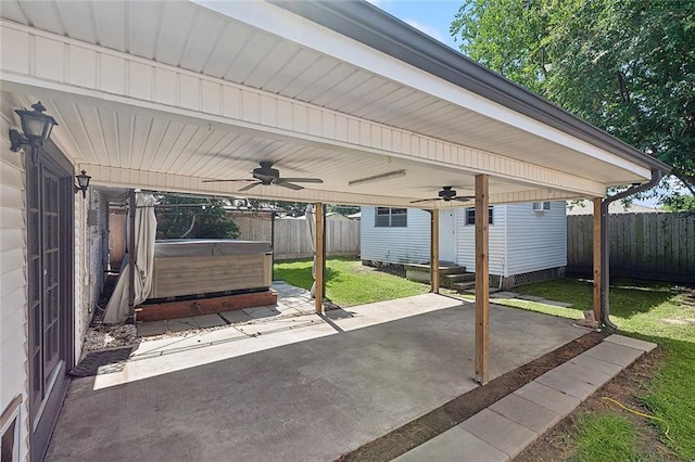 4804 Antonini Dr, Metairie, LA 70006 - view of patio / terrace featuring ceiling fan, a hot tub, and a carport