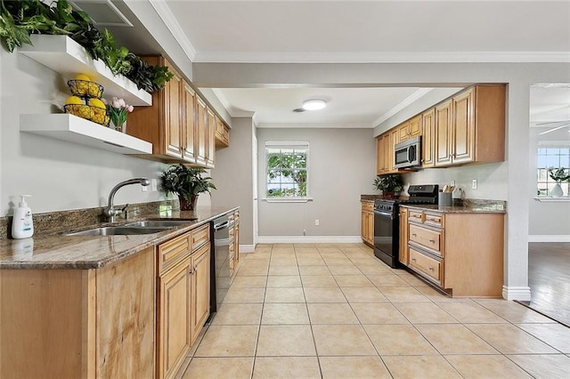 4804 Antonini Dr, Metairie, LA 70006 - kitchen with gas range, stainless steel microwave, a sink, open shelves, and dishwasher