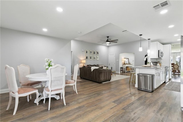 4320 Harvard Ave, Metairie, LA 70006 - dining room featuring ceiling fan, dark wood-style flooring, recessed lighting, and baseboards