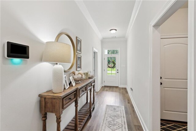 39651 Fairhope Dr, Ponchatoula, LA 70454 - foyer with ornamental molding, wood finished floors, and baseboards