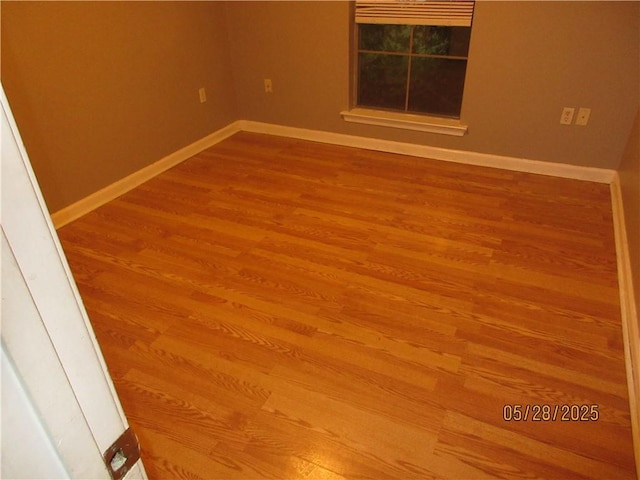 2 Tuscany Dr, La Place, LA 70068 - spare room with wood finished floors and baseboards
