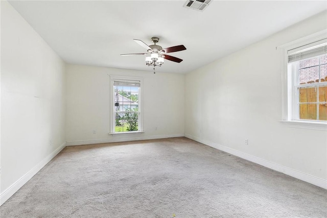 3405 Moss Ln, Violet, LA 70092 - carpeted spare room featuring ceiling fan and baseboards