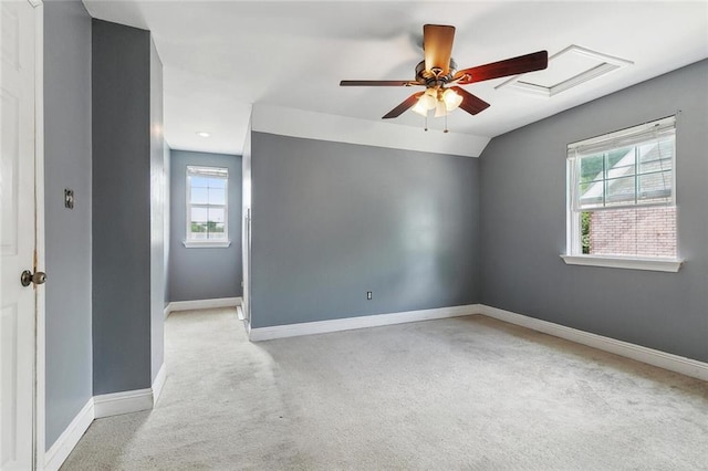 3405 Moss Ln, Violet, LA 70092 - empty room featuring ceiling fan, carpet floors, plenty of natural light, and baseboards