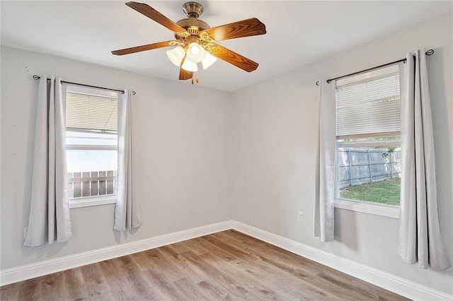 2409 Corinne Dr, Chalmette, LA 70043 - empty room featuring light wood-style flooring, baseboards, and a ceiling fan