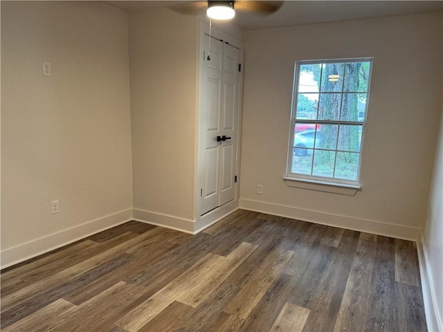 1005 David Dr, Metairie, LA 70003 - empty room with ceiling fan and dark wood-style flooring