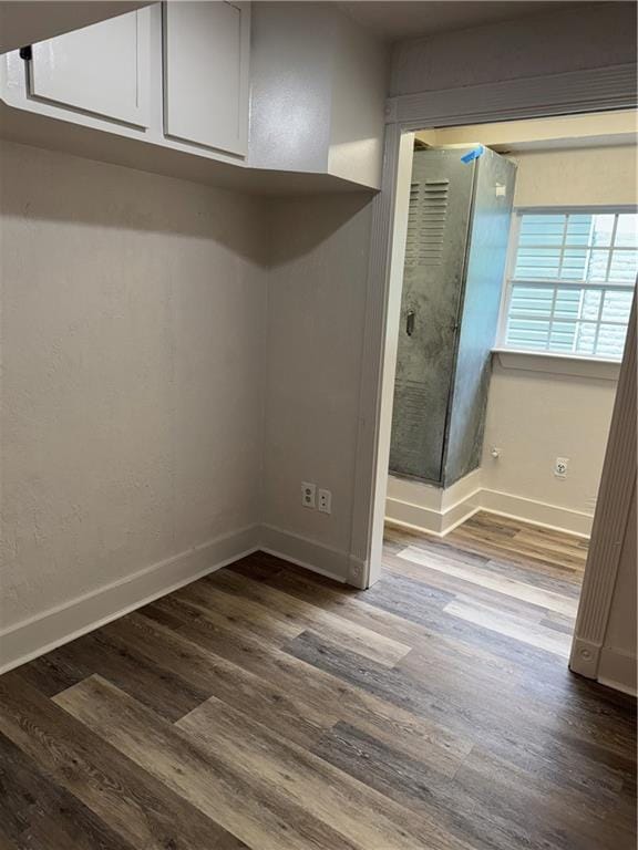 1005 David Dr, Metairie, LA 70003 - mudroom featuring dark wood-style floors and baseboards