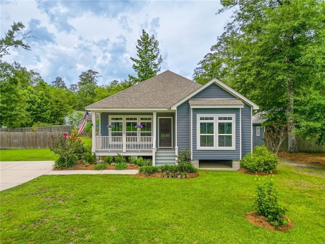 72163 Indian Trail Rd, Abita Springs, LA 70420 - view of front of property with a shingled roof and a porch