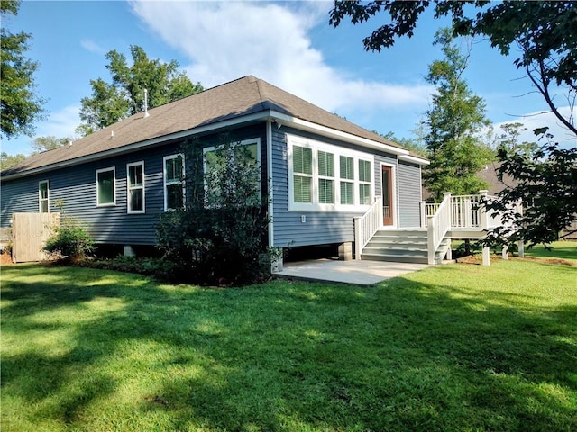 72163 Indian Trail Rd, Abita Springs, LA 70420 - back of house with a lawn, a wooden deck, and a patio area