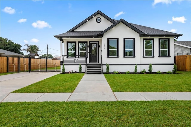 1208 Lucille Ave, Metairie, LA 70003 - view of front of property featuring stucco siding and roof with shingles