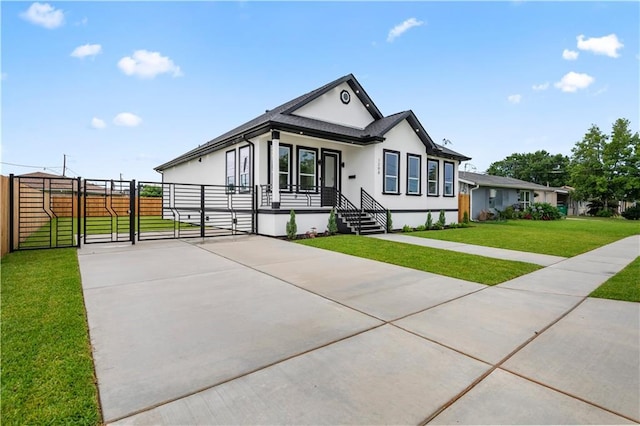 1208 Lucille Ave, Metairie, LA 70003 - ranch-style house with a gate, stucco siding, and driveway