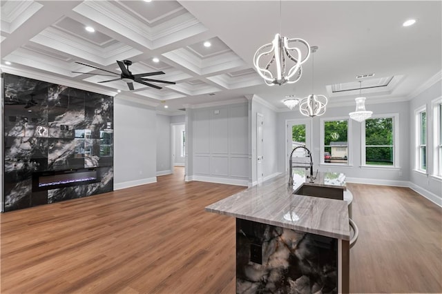 1208 Lucille Ave, Metairie, LA 70003 - living area featuring wood finished floors, baseboards, a high end fireplace, crown molding, and recessed lighting