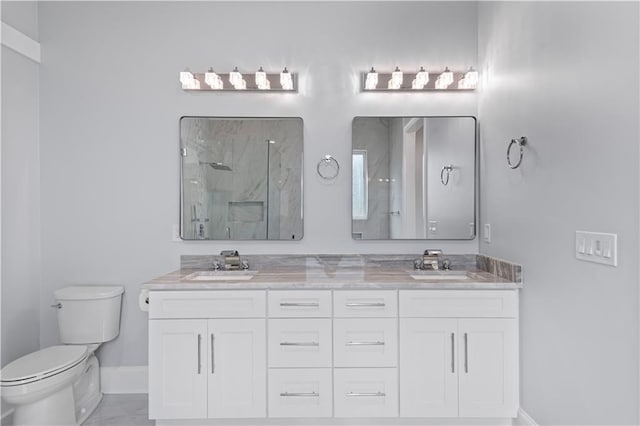1208 Lucille Ave, Metairie, LA 70003 - full bath featuring toilet, a marble finish shower, baseboards, double vanity, and marble look tile flooring