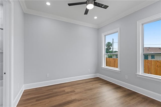 1208 Lucille Ave, Metairie, LA 70003 - spare room with dark wood-style flooring, a ceiling fan, baseboards, crown molding, and recessed lighting