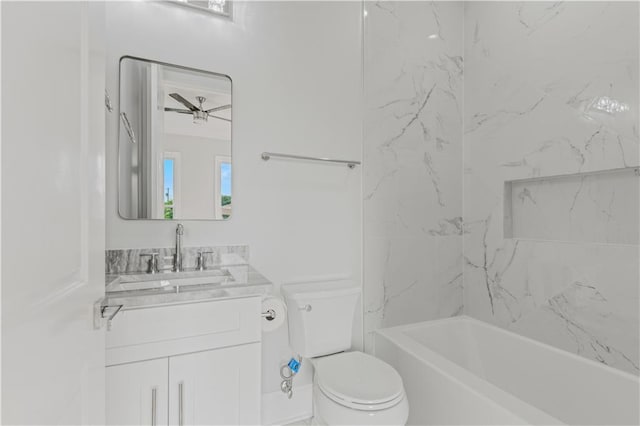 1208 Lucille Ave, Metairie, LA 70003 - full bathroom with toilet, vanity, a ceiling fan, and shower / bathtub combination