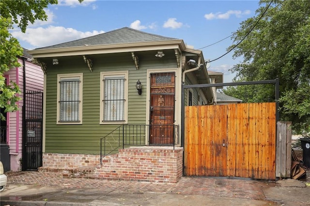 2653 Iberville St, New Orleans, LA 70119 - shotgun-style home with a shingled roof