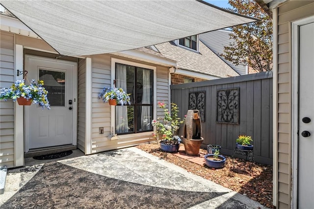 120 W Pineridge St Unit 120, Mandeville, LA 70448 - entrance to property featuring a shingled roof and a patio area