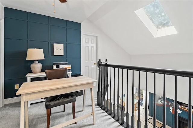 120 W Pineridge St Unit 120, Mandeville, LA 70448 - office with a decorative wall, vaulted ceiling, healthy amount of natural light, a skylight, and light colored carpet