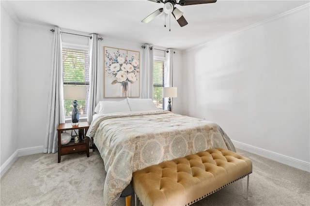 120 W Pineridge St Unit 120, Mandeville, LA 70448 - bedroom featuring light carpet, ornamental molding, and ceiling fan