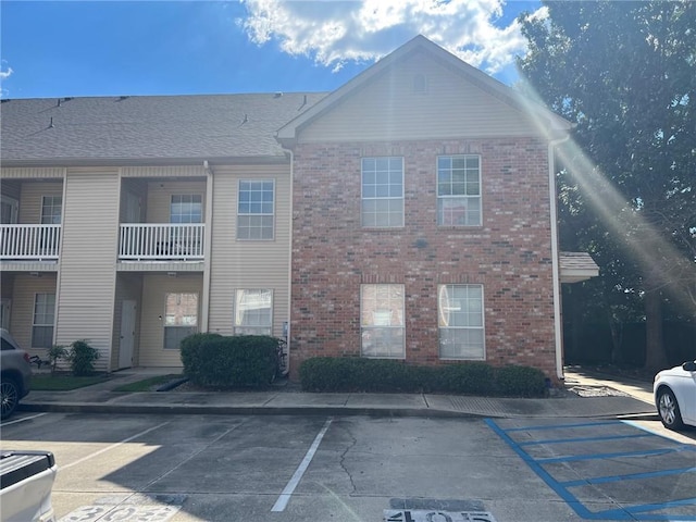 4441 Burbank Dr Unit 308, Baton Rouge, LA 70820 - view of property featuring uncovered parking