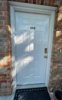 4441 Burbank Dr Unit 308, Baton Rouge, LA 70820 - property entrance featuring brick siding