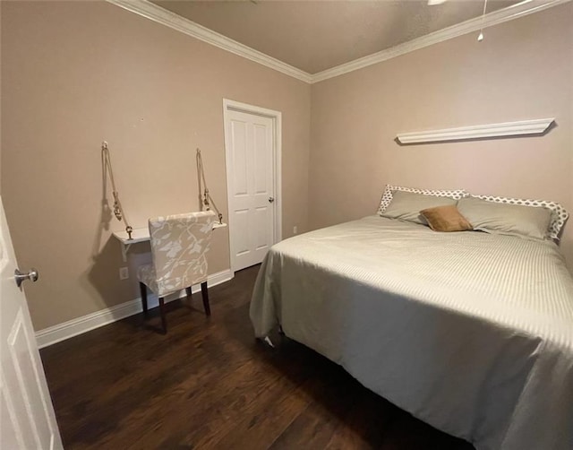 4441 Burbank Dr Unit 308, Baton Rouge, LA 70820 - bedroom with dark wood-style flooring, ornamental molding, and baseboards