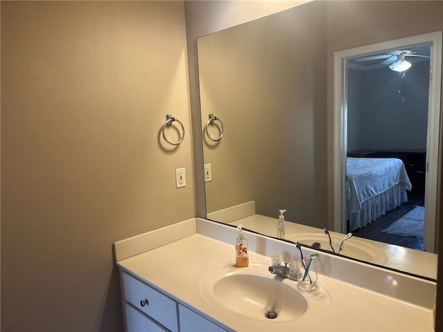 4441 Burbank Dr Unit 308, Baton Rouge, LA 70820 - ensuite bathroom featuring vanity and a ceiling fan