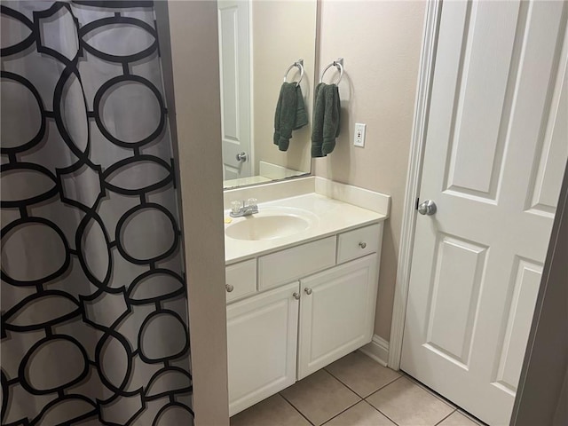 4441 Burbank Dr Unit 308, Baton Rouge, LA 70820 - full bath featuring tile patterned floors, vanity, and a shower with curtain