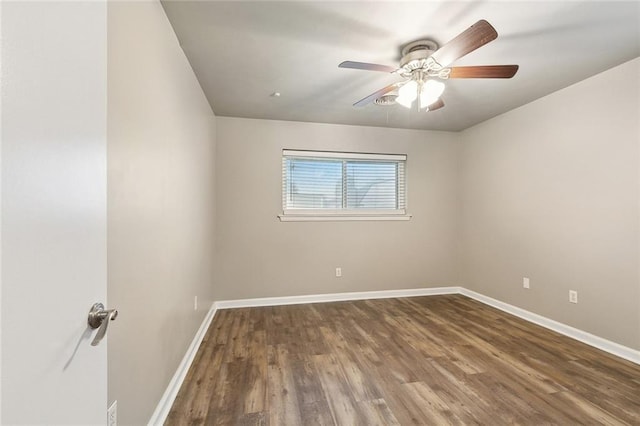 4509 Purdue Dr, Metairie, LA 70003 - spare room with wood finished floors, baseboards, and a ceiling fan