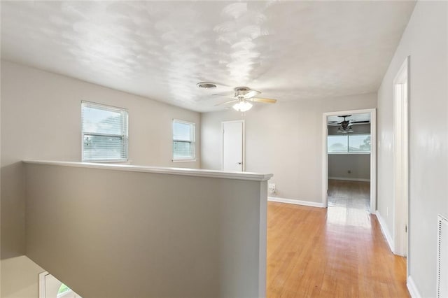 4509 Purdue Dr, Metairie, LA 70003 - hall featuring light wood-type flooring and baseboards