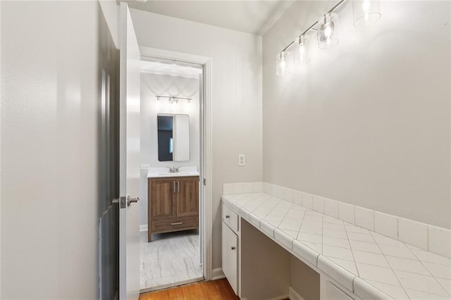 4509 Purdue Dr, Metairie, LA 70003 - bathroom with vanity and wood finished floors