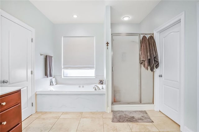 1067 Scarlet Oak Ln, Mandeville, LA 70448 - full bath with a garden tub, a shower stall, vanity, and tile patterned flooring