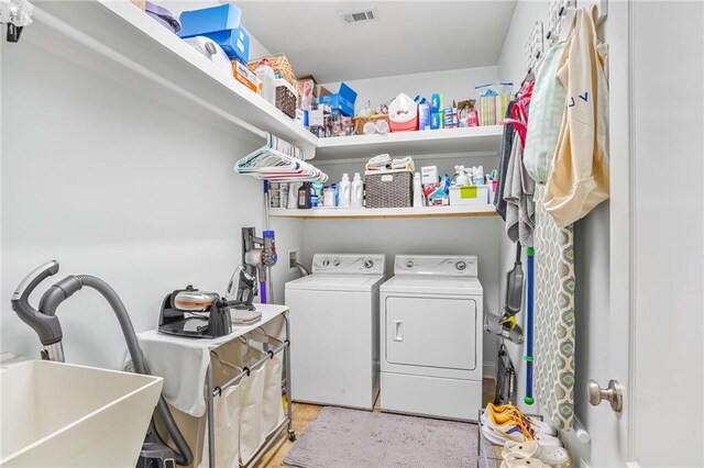 1067 Scarlet Oak Ln, Mandeville, LA 70448 - laundry area featuring separate washer and dryer