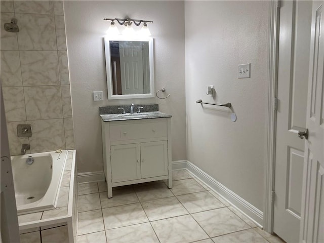 1919 Stephen Girard St, New Orleans, LA 70122 - full bathroom with vanity, baseboards, and tile patterned floors