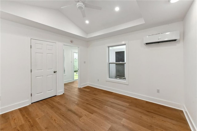 35210 Windsor Dr, Slidell, LA 70460 - empty room with an AC wall unit, wood finished floors, recessed lighting, baseboards, and ceiling fan
