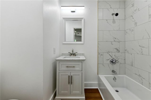 35210 Windsor Dr, Slidell, LA 70460 - full bath featuring vanity, tub / shower combination, and baseboards