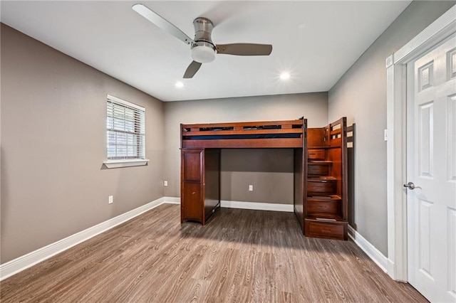 3816 Jean Lafitte Pkwy, Chalmette, LA 70043 - bedroom with wood finished floors, baseboards, recessed lighting, and a ceiling fan