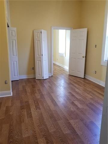 2607 Soniat St, New Orleans, LA 70115 - unfurnished bedroom with wood finished floors
