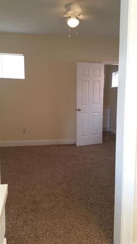 2607 Soniat St, New Orleans, LA 70115 - carpeted spare room with baseboards