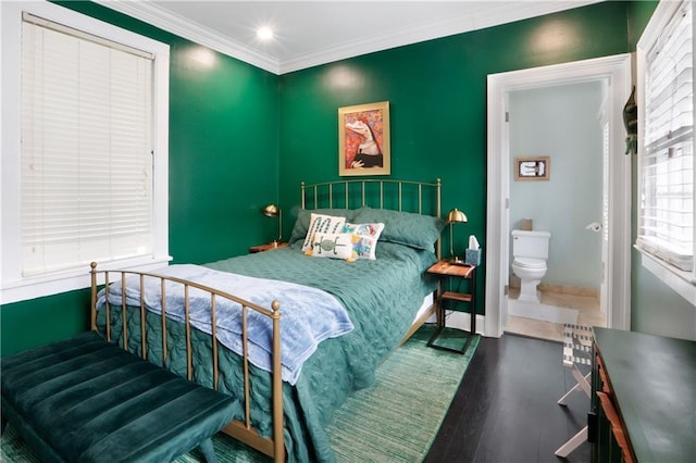 1030 Kerlerec St Unit 6, New Orleans, LA 70116 - bedroom with wood finished floors, ornamental molding, baseboards, recessed lighting, and ensuite bathroom