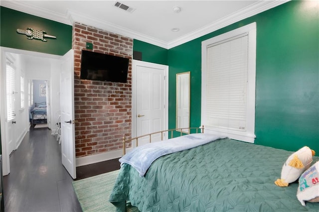 1030 Kerlerec St Unit 6, New Orleans, LA 70116 - bedroom with baseboards, wood finished floors, and ornamental molding