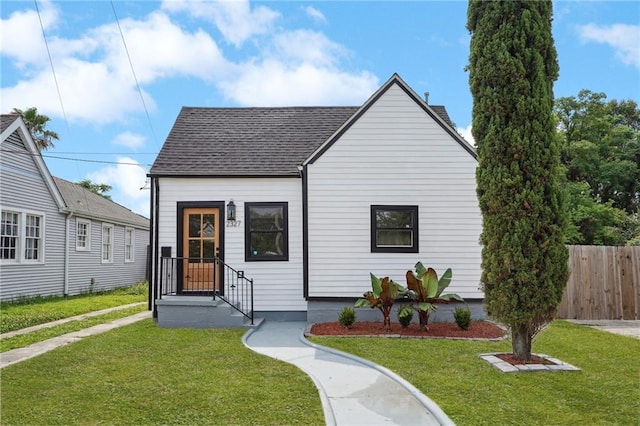 2327 Pauline St, New Orleans, LA 70117 - view of front facade with roof with shingles