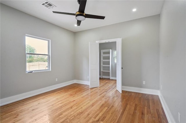 2327 Pauline St, New Orleans, LA 70117 - unfurnished room with a ceiling fan, light wood-type flooring, baseboards, and recessed lighting