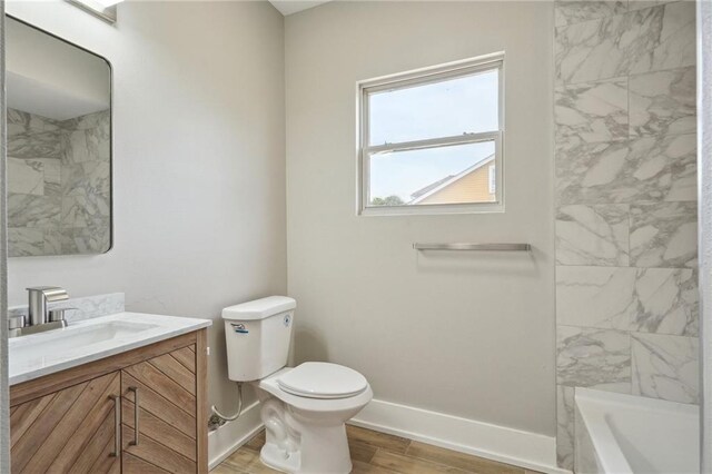 2327 Pauline St, New Orleans, LA 70117 - full bathroom featuring vanity and wood finished floors