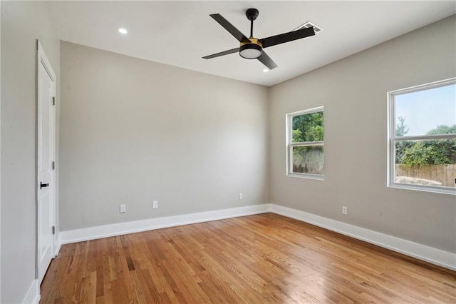 2327 Pauline St, New Orleans, LA 70117 - unfurnished room featuring light wood-style floors, baseboards, a ceiling fan, and recessed lighting