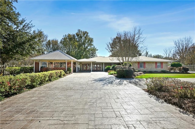 2108 Washington St, Franklinton, LA 70438 - ranch-style house featuring decorative driveway and brick siding